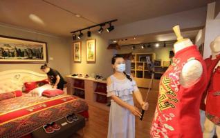 E-commerce revitalizes traditional brocade business in Zhangjiajie